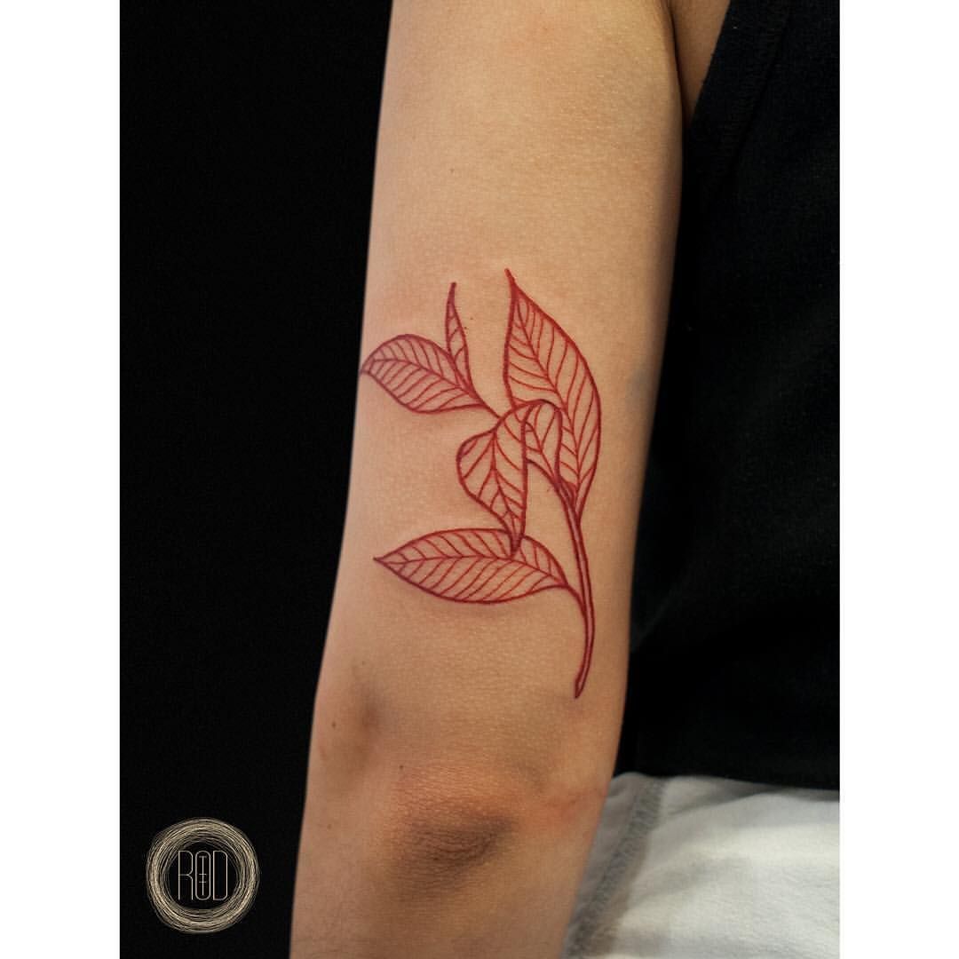 Red leaves inked on the back of the left arm -   20 tattoo arm back
 ideas