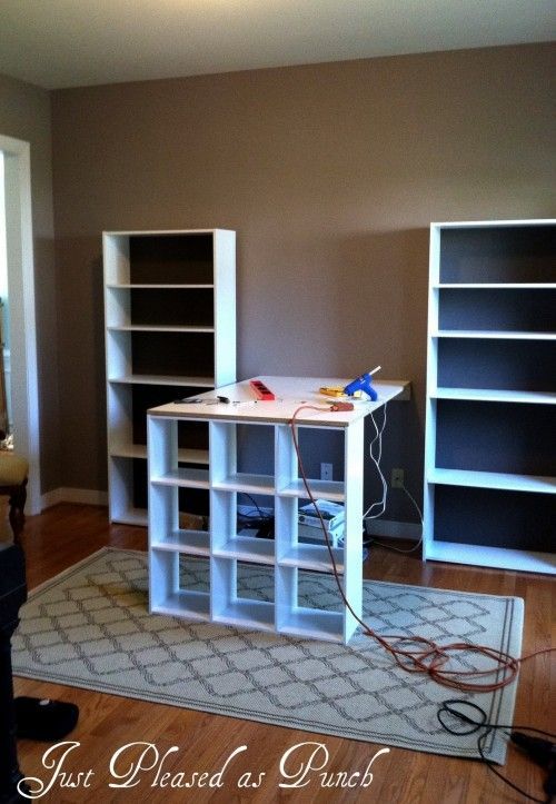 A Budget-Friendly Craft Room:  could put two book cases on either side of the window then use a folding table coming out like this from the window.  Put existing pieces I have along the wall.  That will leave room for a bed or an air mattress if I need one in that room. -   24 standing crafts table
 ideas