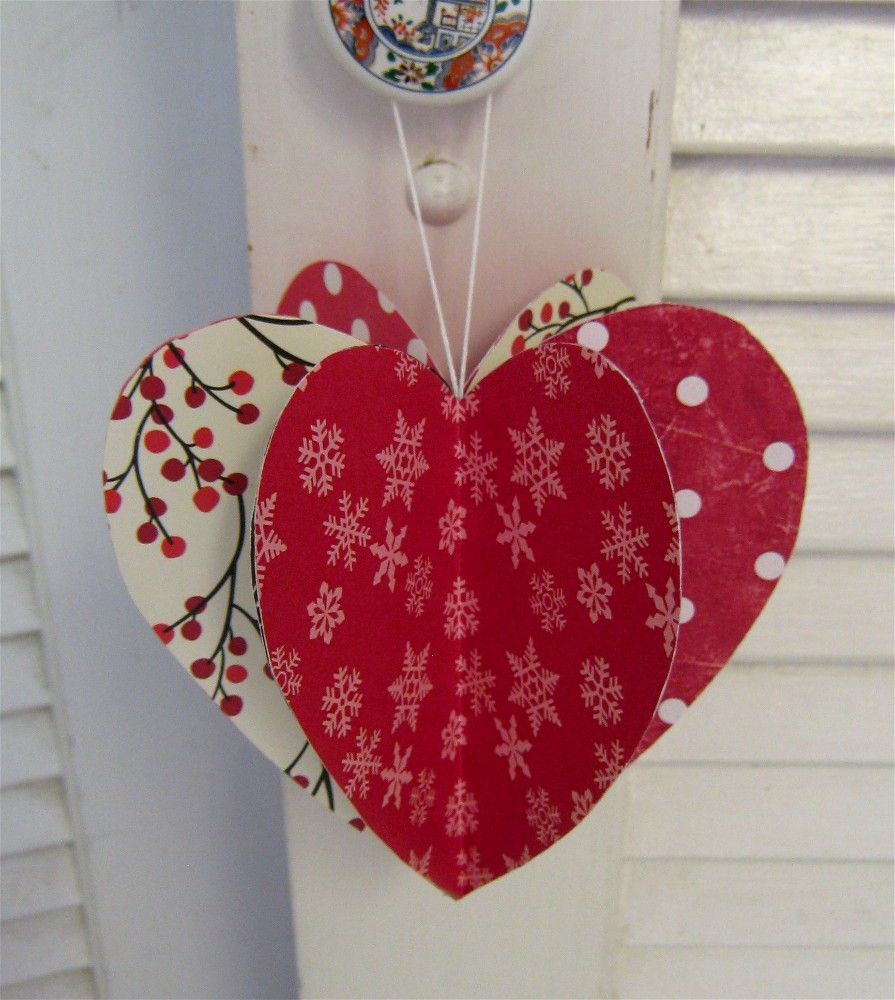 It would be fun to make a REALLY large one to hang from a light fixture -   24 valentine paper crafts
 ideas