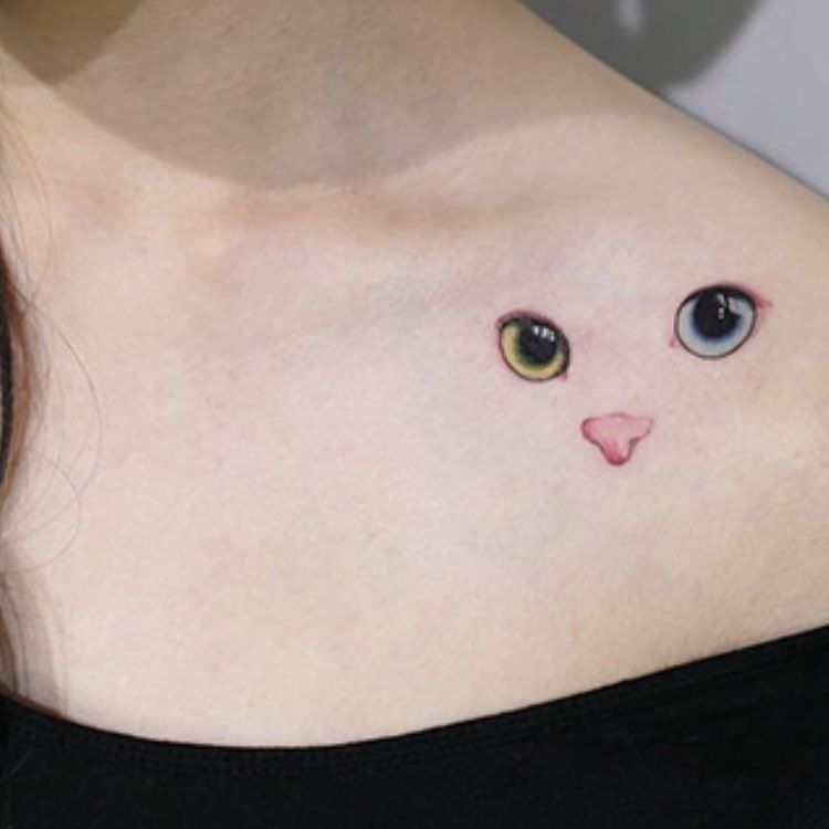 24 Beautiful Cat Tattoos To Inspire Your Next Ink Session -   22 cat tattoo back
 ideas