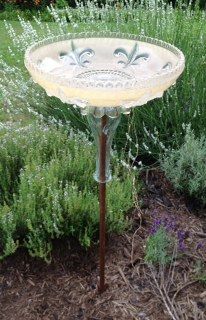 Repurposed Glass Light Shades -   22 garden art bird baths
 ideas