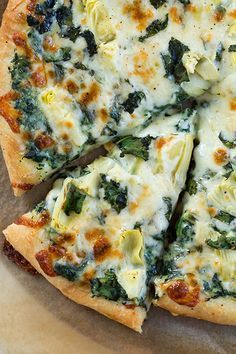 Spinach Artichoke Pizza - this is definitely one of the best pizzas I've ever made at home! It's a restaurant copycat recipe - made with bechemel sauce, provolone, mozzarella, parmesan, fresh spinach and canned artichoke hearts. -   22 home made pizza recipes
 ideas