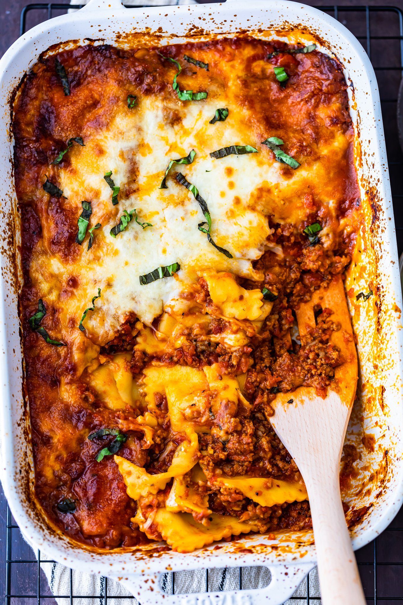 Ravioli Lasagna is a delicious mix of two favorite pasta dishes. This cheesy ravioli casserole is made with layers of ravioli, marinara sauce mixed with Italian sausage, and plenty of cheese. It's an easy lasagna recipe with an extra kick! Everyone will love this ravioli lasagna bake. -   22 lasagna recipes sausage
 ideas