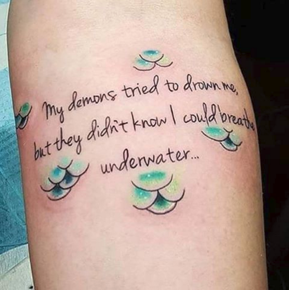 Complete your ink with a mermaid mantra. -   23 mermaid tattoo for women
 ideas