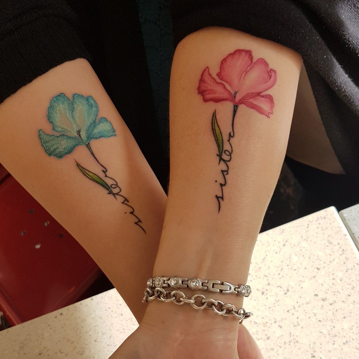 My new sister tattoo. I got the pink one and my sister blue. We got these done at Studio 21 in Las Vegas. -   23 sister tattoo kids
 ideas
