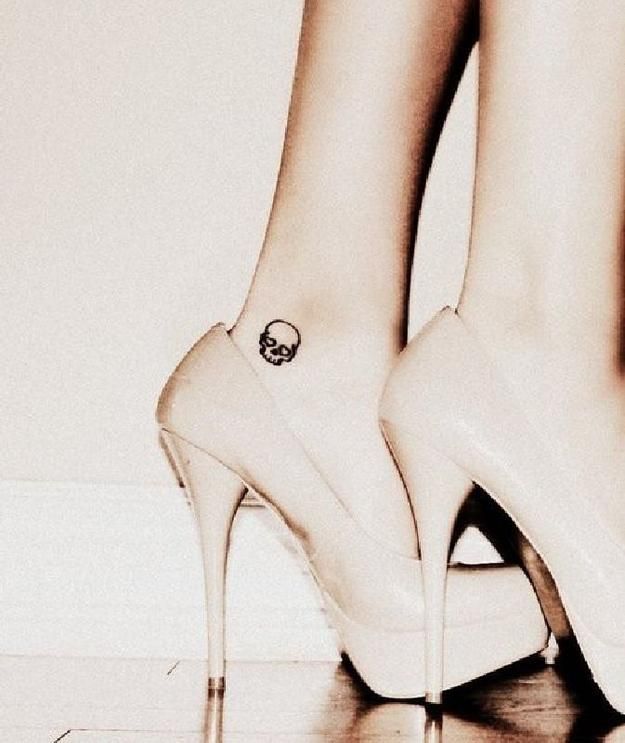 74 Of The Tiniest, Most Tasteful Tattoos Ever -   13 mini skull tattoo
 ideas