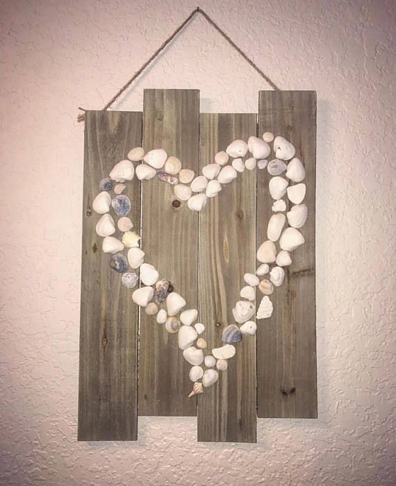 Shell wall hanging -   17 shell crafts wall
 ideas
