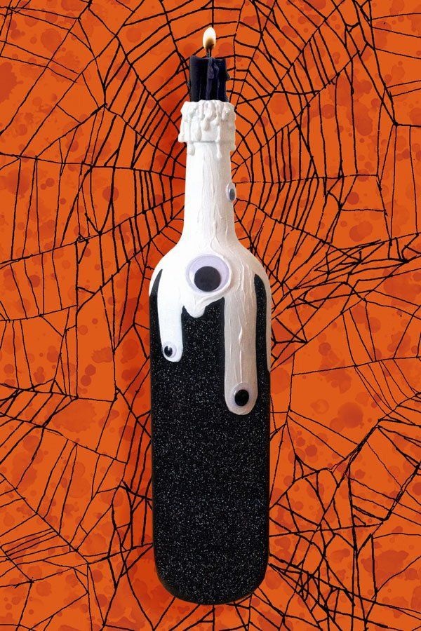 multiple coats of Krylon Looking Glass Spray Paint to the inside of the bottle. Lightly apply silver spray paint if it gets too translucent.  Buy Krylon Looking Glass Here -   25 halloween wine bottle
 ideas