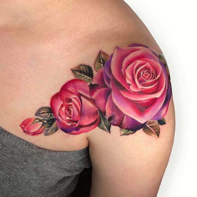 This pink and purple rose is fit for a fairy queen. -   14 pink rose tattoo
 ideas