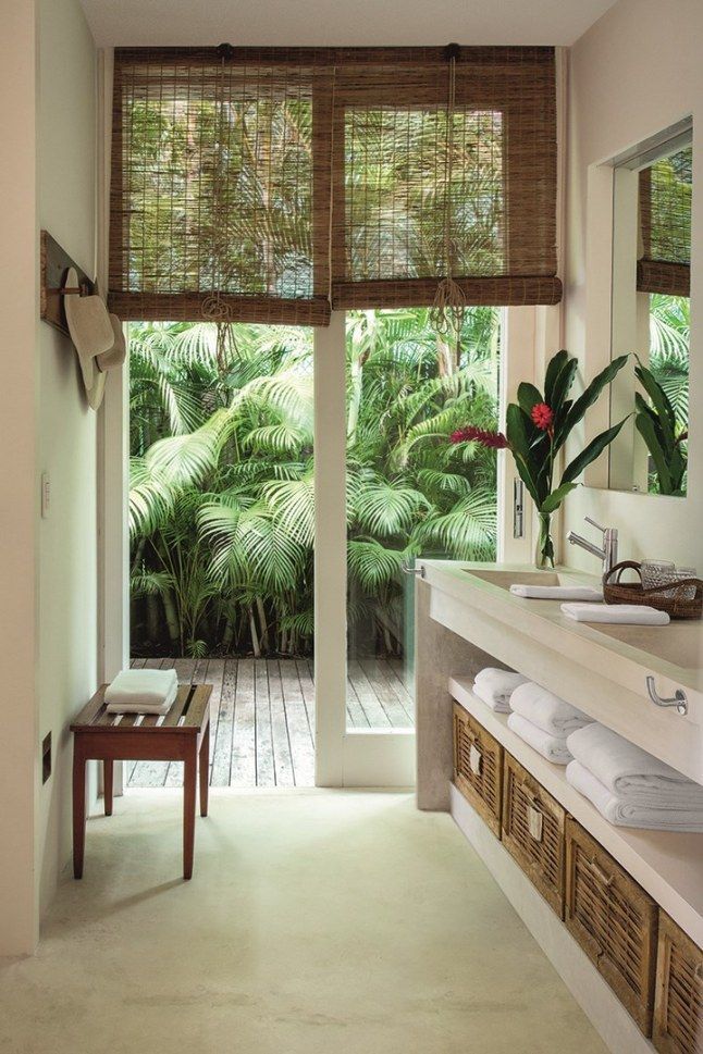 Une maison d'architecte entre mer et nature au Br?sil -   16 garden design Tropical living rooms
 ideas