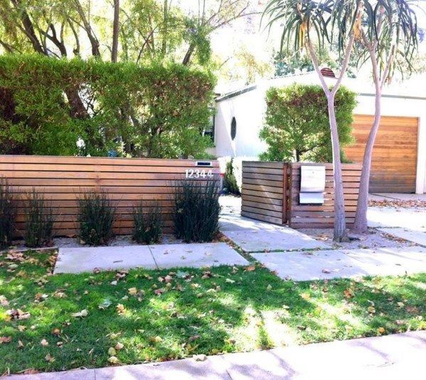 Top 60 Best Front Yard Fence Ideas - Outdoor Barrier Designs -   18 garden design Wood fence ideas