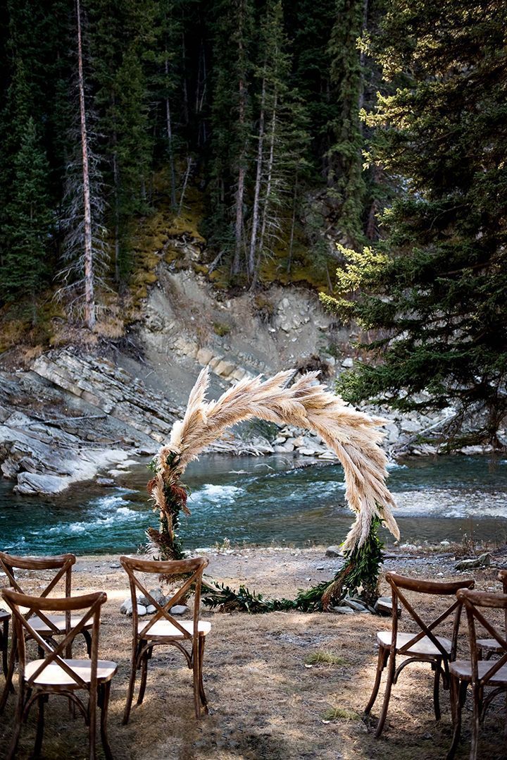Pampas Grass Circular Ceremony Arbor Frames The Rocky Mountain River -   16 wedding Bohemian men ideas