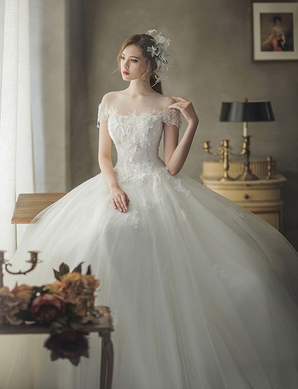 This off-the-shoulder wedding dress from J Sposa featuring beautiful floral appliques is fit for a modern princess! -   12 dress Beautiful fairytale ideas