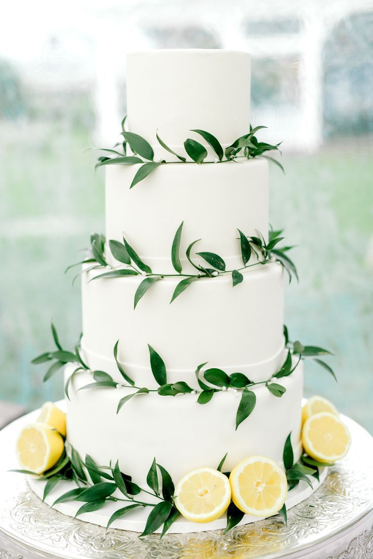 This minimal white wedding cake with lemon accents is so simple and elegant that… -   10 minimal cake Simple ideas
