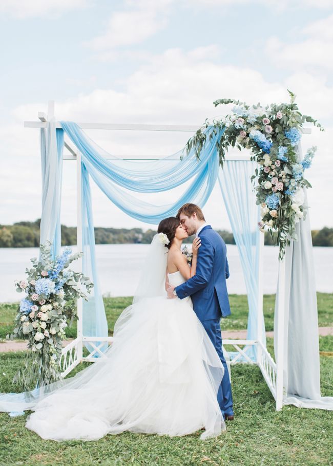 This romantic outdoor wedding inspired by the blue sky and airy clouds is incredibly breathtaking! -   15 wedding Blue arch ideas