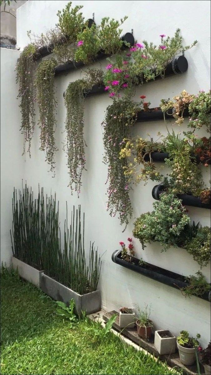+55 Modern And Elegant Vertical Wall Planter Pots Ideas -   22 garden design Wall art ideas