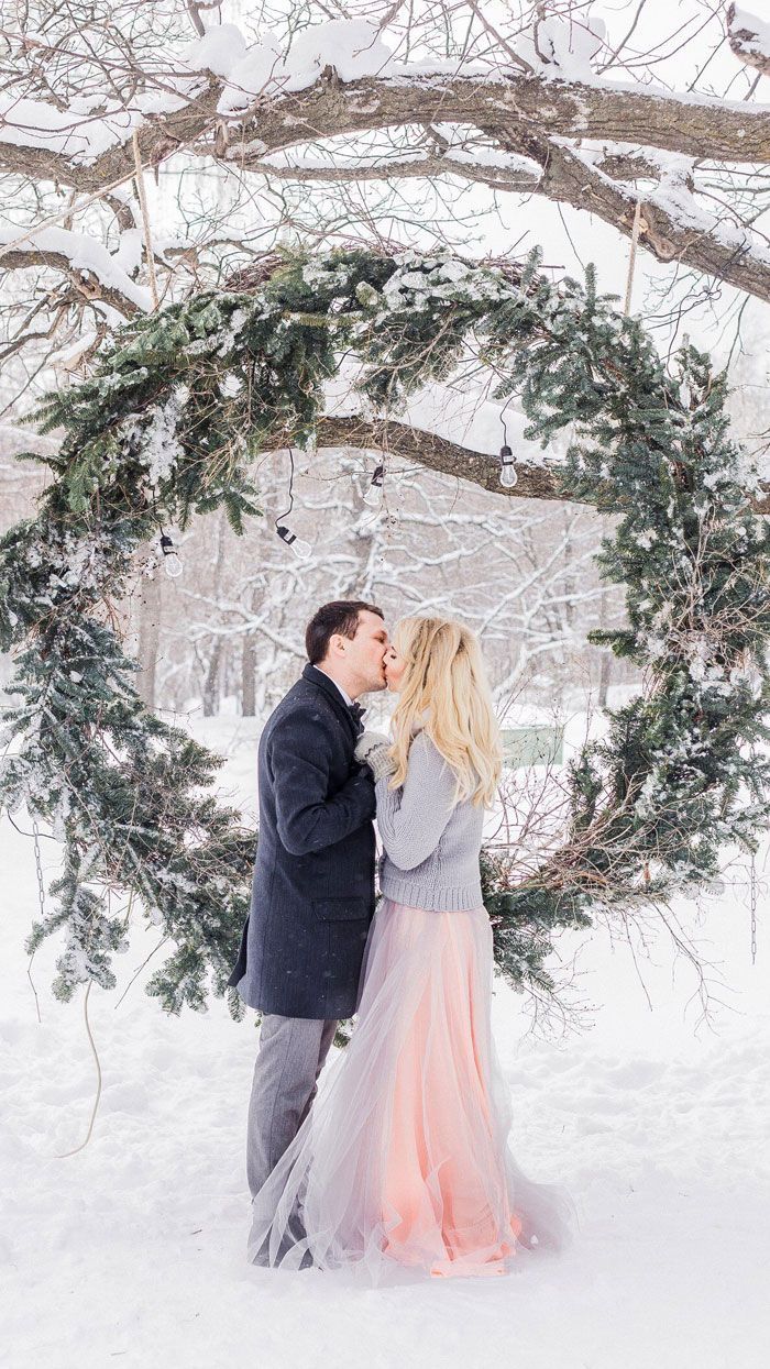 Dreamy winter wedding photos with snow background -   14 winter wedding Arch ideas