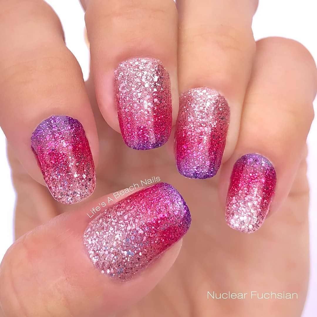 Billie Breeden aka NailSpice on Instagram: “For an unabashedly feminine glitter gradient, we love the vibrant purple to light pink fade of Nuclear Fuchsian.” -   9 nuclear fusion color street ideas