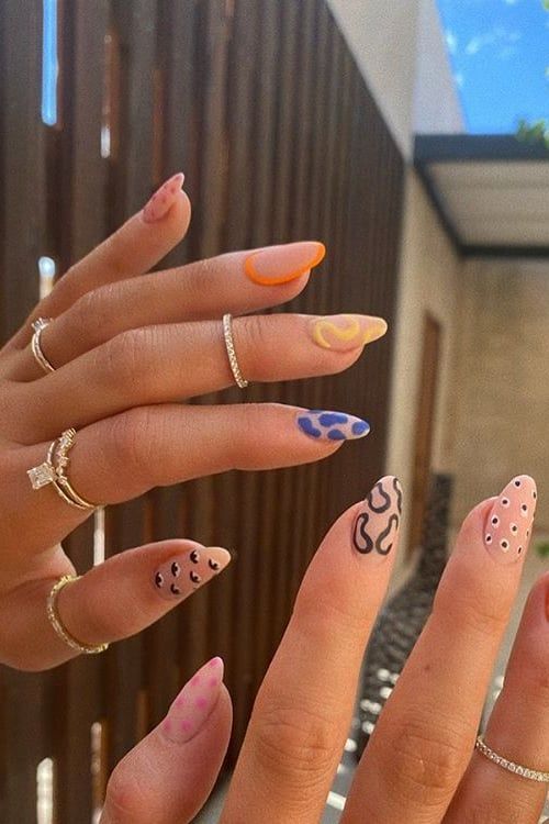 Kylie Jenner Put a Twist on the Negative-Space Nail-Art Trend With a Mismatched Manicure -   beauty Nails art