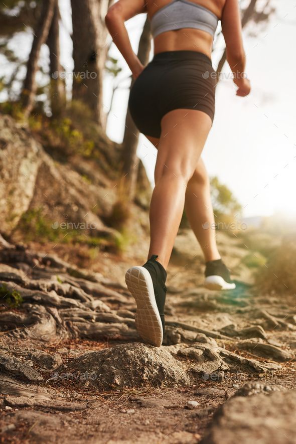 Woman running on rocky trails -   17 fitness Photography running ideas