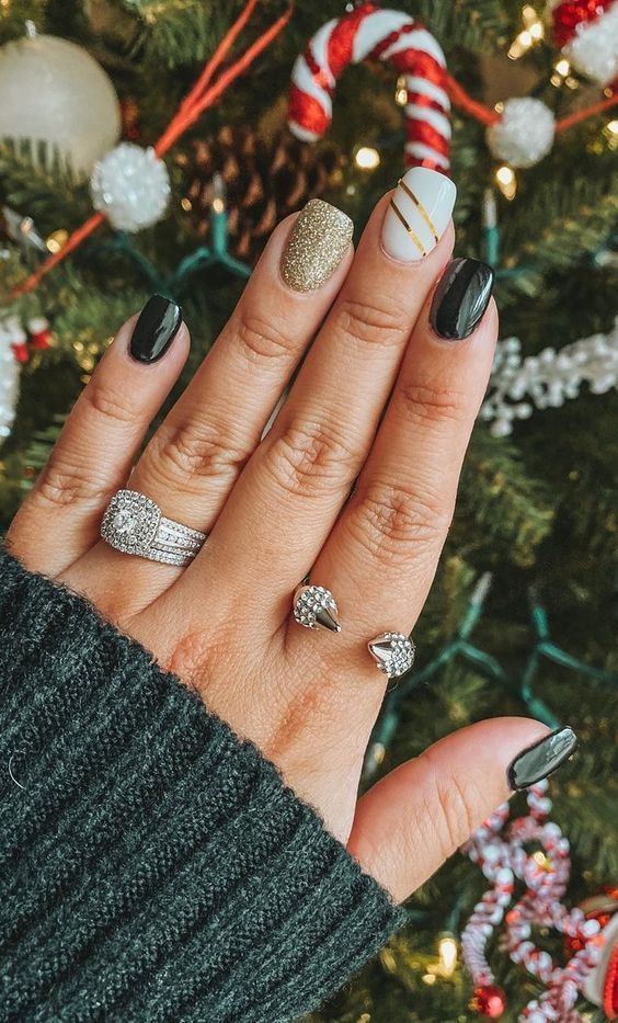 50+ Stylish Christmas Nail Colors and How To Do Them | -   20 xmas nails simple gold glitter ideas