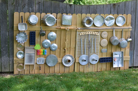 11. Make a Music Wall -   25 Outdoor Play Areas For Kids Transforming Regular Backyards Into Playtime Paradises